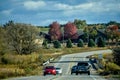 Cars Traveling Down Two Lane Road