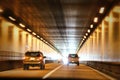 Cars traveling through a tunnel. Royalty Free Stock Photo