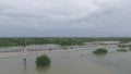 Cars and trucks trying to drive through flooded i45 near Houston Texas