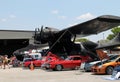 Cars under airplane wing