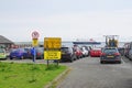 Cars waiting for ferry at ferry terminal