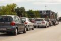 Cars waiting in queue line for the traffic lights to change to green. Royalty Free Stock Photo