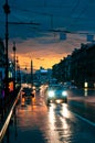 Cars on wet road at night Royalty Free Stock Photo