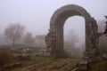 Carsulae arc ruins in the mist