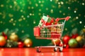 Cart with christmas and new year gifts on blurred green background with bokeh