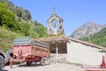 Cart in front of a church in a village Royalty Free Stock Photo