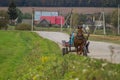 A cart with a horse in a Russian village.