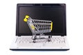 Cart and keyboard. online shopping Royalty Free Stock Photo