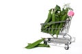 Many green peas pods lie in a shopping cart on a white background Royalty Free Stock Photo