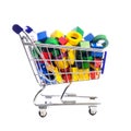 Cart or shopping trolley full of wooden blocks and building bricks Royalty Free Stock Photo