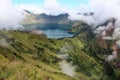 Carter lake of mt Rinjani in the clouds Royalty Free Stock Photo
