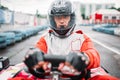 Carting race, go kart driver in helmet, front view Royalty Free Stock Photo