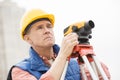 Cartographer With Theodolite At Construction Site Royalty Free Stock Photo