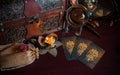 Magical Tarot cards at table, fortune telling concept