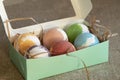 Carton box with bath bombs on table