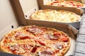 Carton boxes with delicious pizzas Royalty Free Stock Photo