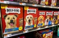 Sacramento, CA/USA 02/07/2022 Carton boxes of Milk Bone brand Biscuits for dogs for sale in a supermarket aisle