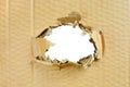 Carton cardboard hole background Royalty Free Stock Photo