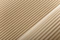 Carton or cardboard packing material. Texture of corrugated paper sheets made from cellulose. Supplies for creating boxes. Royalty Free Stock Photo