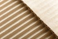 Carton or cardboard packing material. Texture of corrugated paper sheets made from cellulose. Supplies for creating boxes. Royalty Free Stock Photo