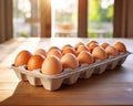 carton of eggs stored in row wise with proper lighting and placed on the table.