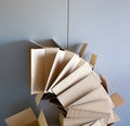 Carton open boxes stacked on curved circle shape