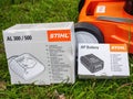 carton package with Stihl Ap Battery and its Al 300 and 500 charger for the lawn