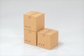 The cartons are stacked against a white background, 3d rendering