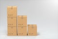 The cartons are stacked against a white background, 3d rendering