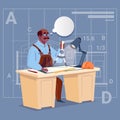 Cartoon African American Builder Sitting At Desk Working On Blueprint Building Plan Architect Engineer