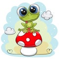 Cartoon Baby Frog is sitting on the mushroom Royalty Free Stock Photo