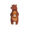 Cartoon bear standing with little wooden honey barrel