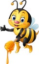 Cartoon bee holding honey dipper