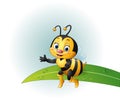 Cartoon bee sitting on a leaf Royalty Free Stock Photo