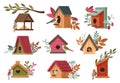 Cartoon birds and starling boxes. Little bird feeder and rustic wooden homes with floral decorations vector illustration Royalty Free Stock Photo