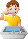 Cartoon boy brushing teeth Royalty Free Stock Photo