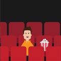 Cartoon boy sitting in movie theater. Film show Cinema background. Viewer watching movie. Popcorn box on red seat. Flat design Royalty Free Stock Photo