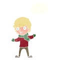 cartoon boy in winter clothes with thought bubble Royalty Free Stock Photo