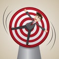 Cartoon businessman locked on spinning target
