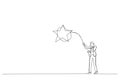 Cartoon of businesswoman throws a lasso, catching star. Continuous line art style