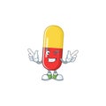 Cartoon character design concept of red yellow capsules cartoon design style with wink eye