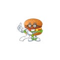 Cartoon character of hamburger holding menu on his hand