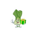 Cartoon character of happy bok choy with gift box