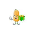 Cartoon character of happy butternut squash with gift box