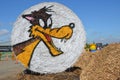 Cartoon character painted on a rolled hay bale for Halloween Royalty Free Stock Photo