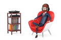 Cartoon Character Person Sits in Red Leather Relax Chair and Listens Music in Headphones near Turntable Vinyl Player, Stereo