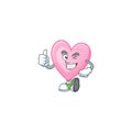 Cartoon character of pink love making Thumbs up gesture