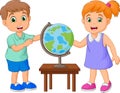 Cartoon children looking at globe on the table Royalty Free Stock Photo