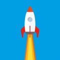 Cartoon Colored soaring spaceship on blue background,flat Rocket Royalty Free Stock Photo