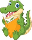 Cartoon crocodile reading a book Royalty Free Stock Photo